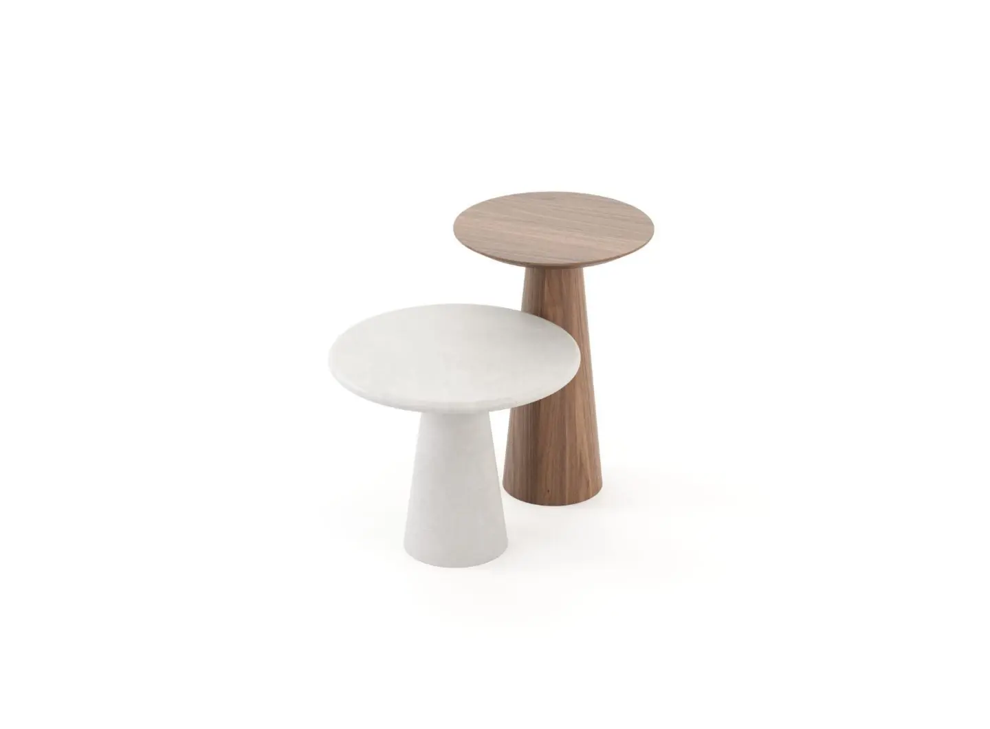 I tavolini Olivier appaiono su uno sfondo bianco come due pezzi rotondi con piani lisci e basi affusolate, uno in grigio chiaro e l’altro in legno caldo, i materiali a contrasto esaltando le curve delicate e la semplicità moderna del design.
