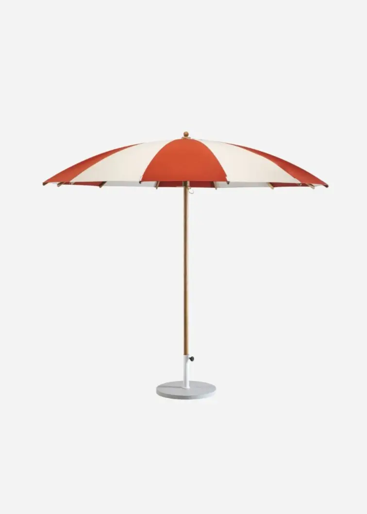 Ginko parasol with iron base clad in Lava Stone Bone White.